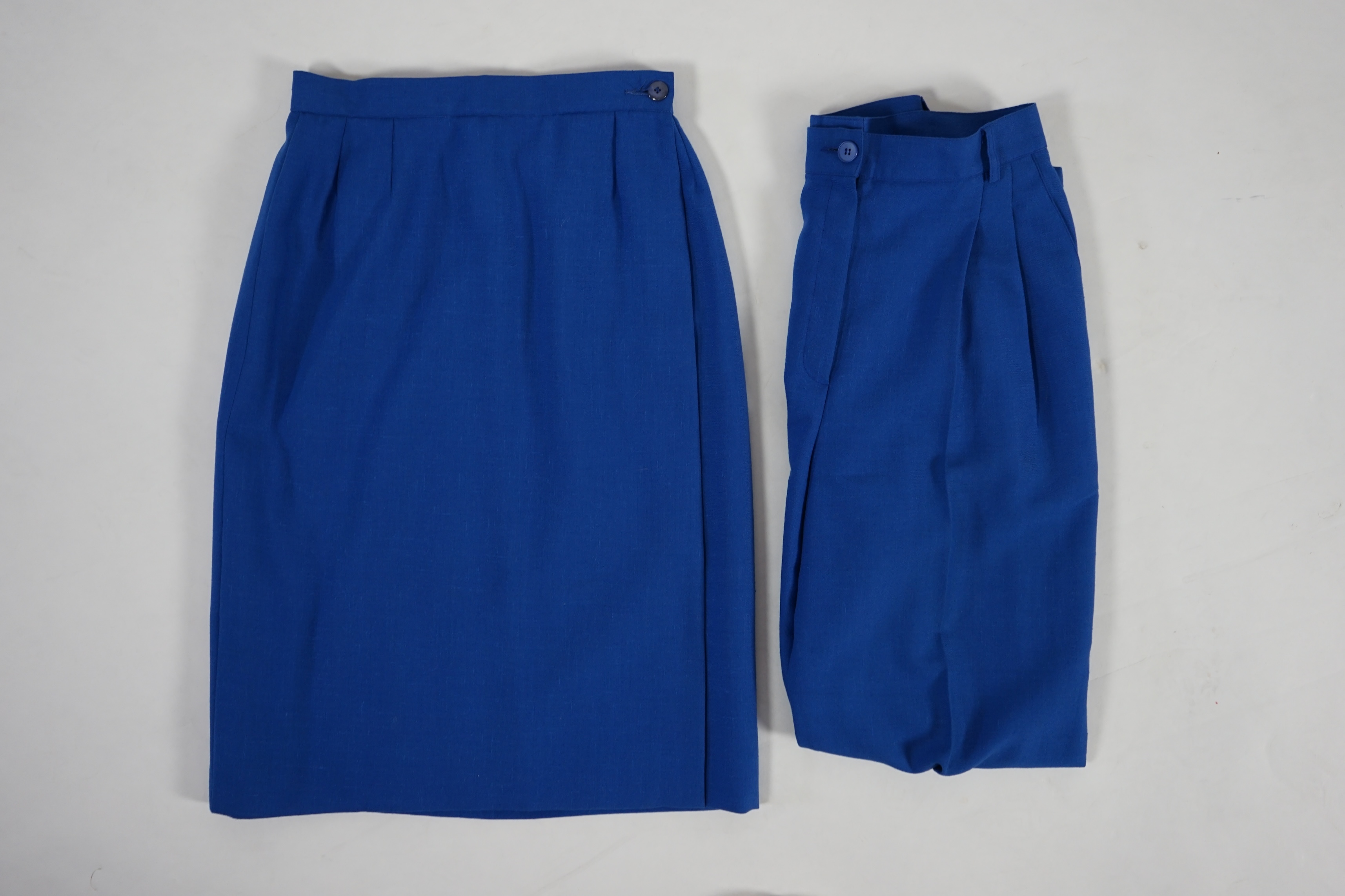 A vintage Yves Saint Laurent variation lady's royal blue wool skirt and trousers. Approx size UK 10 Please note alterations to make the waist smaller may have been carried out on some of the skirts and trousers. Proceeds